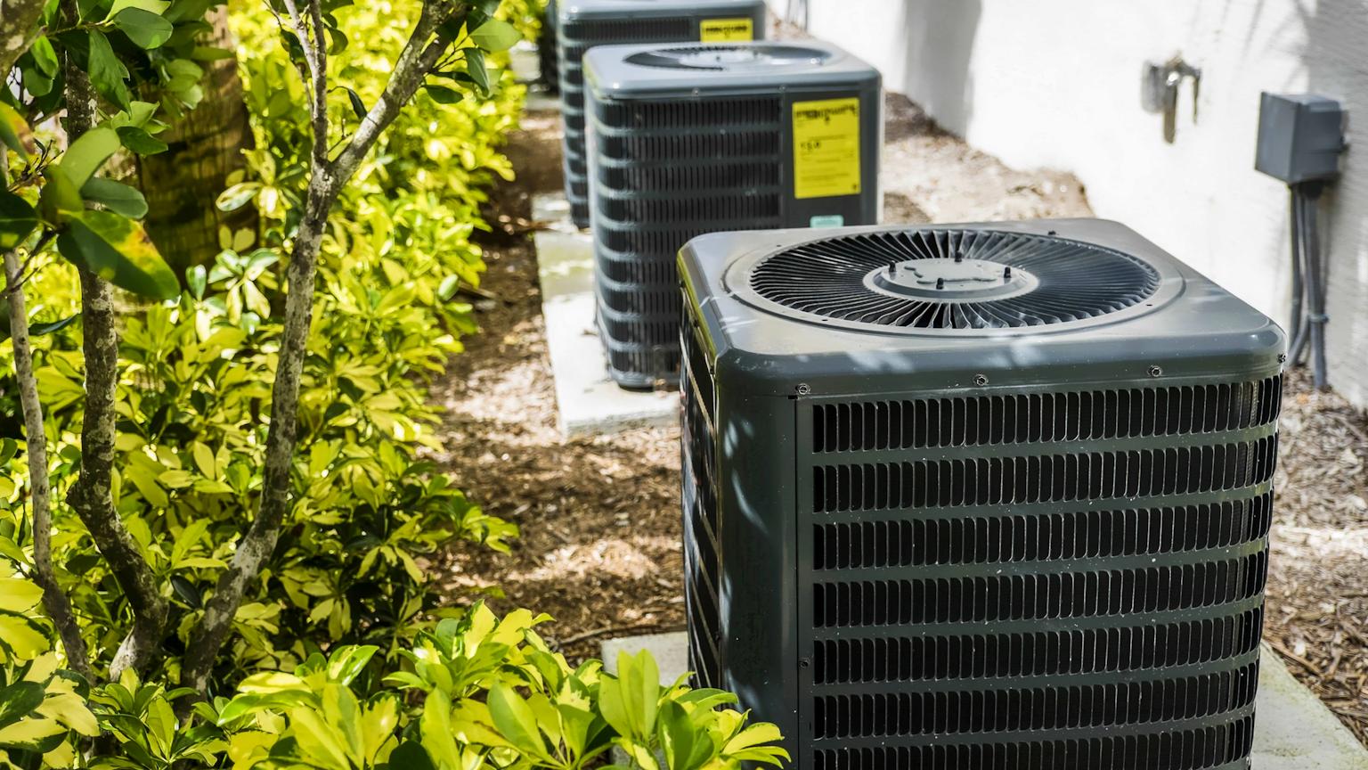 Professional HVAC technician working in Portland homes - HVA Climate Control